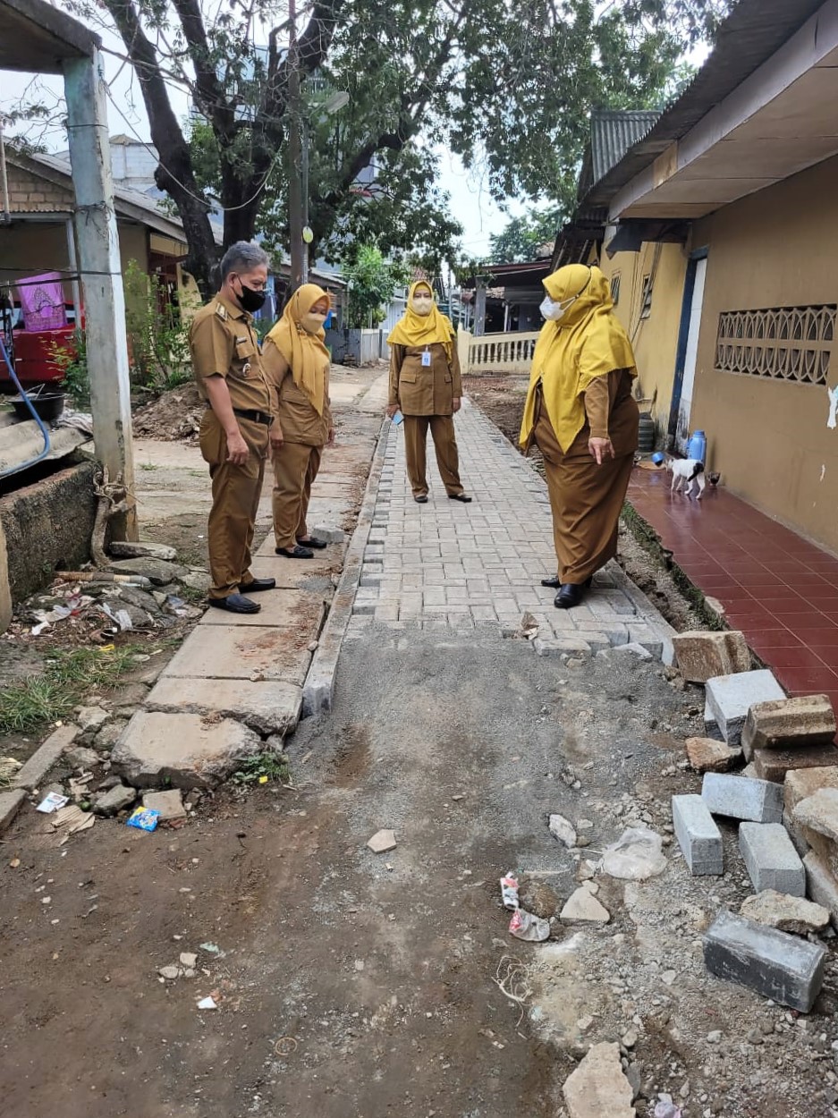 Monitoring Kegiatan Pembangunan Jalan oleh DPUPR Provinsi Banten di Lingkungan RW 03 Kelurahan Paninggilan Utara